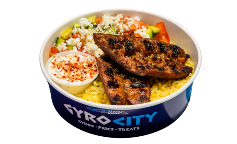 Gyro City on McDougal Street classic lamb gyro with warm pita and tzatziki